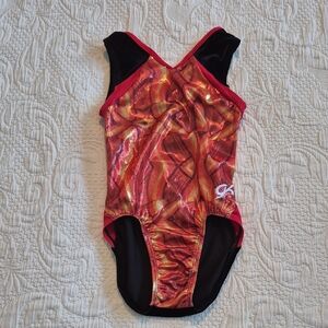 GK child Medium orange, gold & black red, dance, gymnastics VGUC